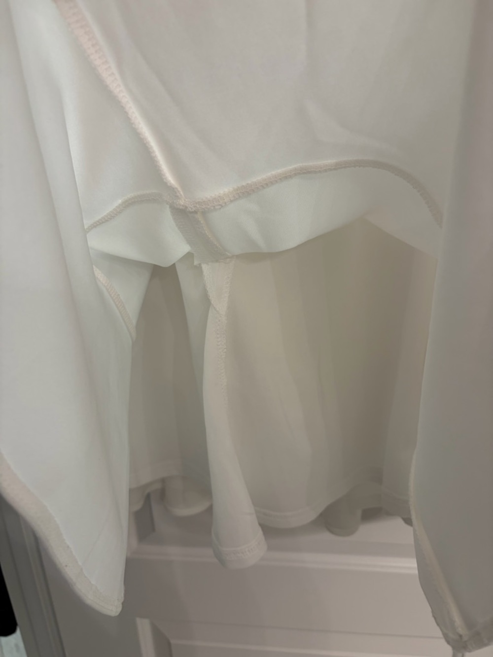 Lulu's White Sleeveless Ruffle-Hem Mini Dress - Picture 4 of 4